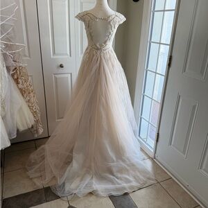 Vintage Galina Signature Cream and White Dress by David’s Bridal.